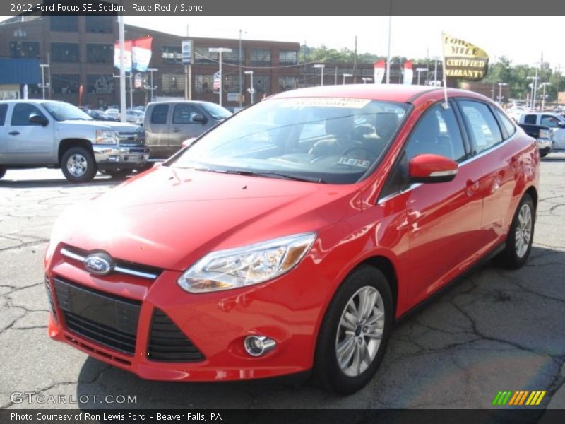 Race Red / Stone 2012 Ford Focus SEL Sedan