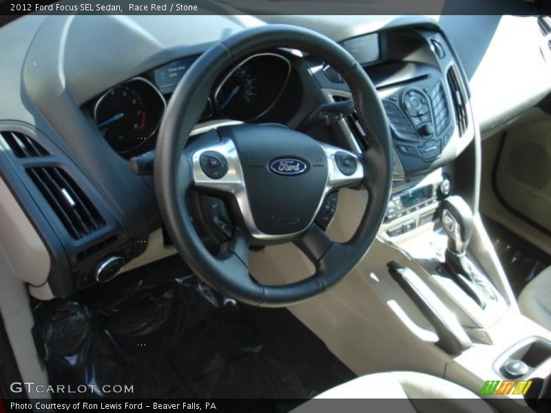 Race Red / Stone 2012 Ford Focus SEL Sedan