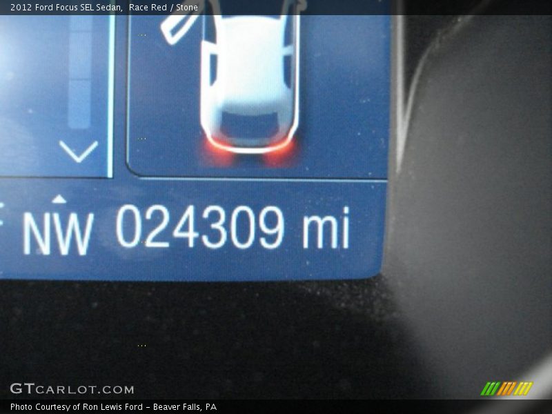 Race Red / Stone 2012 Ford Focus SEL Sedan