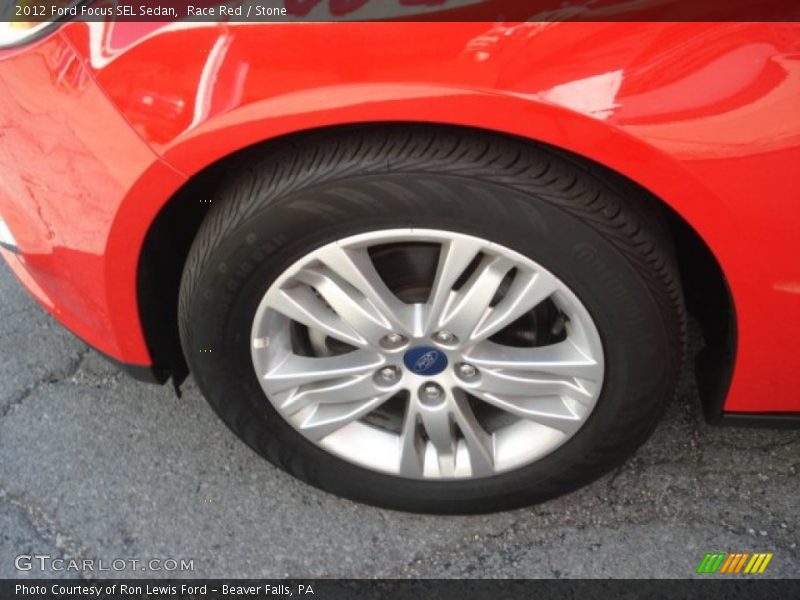 Race Red / Stone 2012 Ford Focus SEL Sedan
