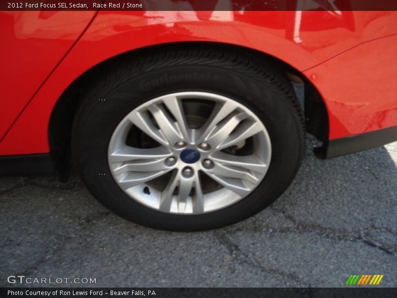 Race Red / Stone 2012 Ford Focus SEL Sedan