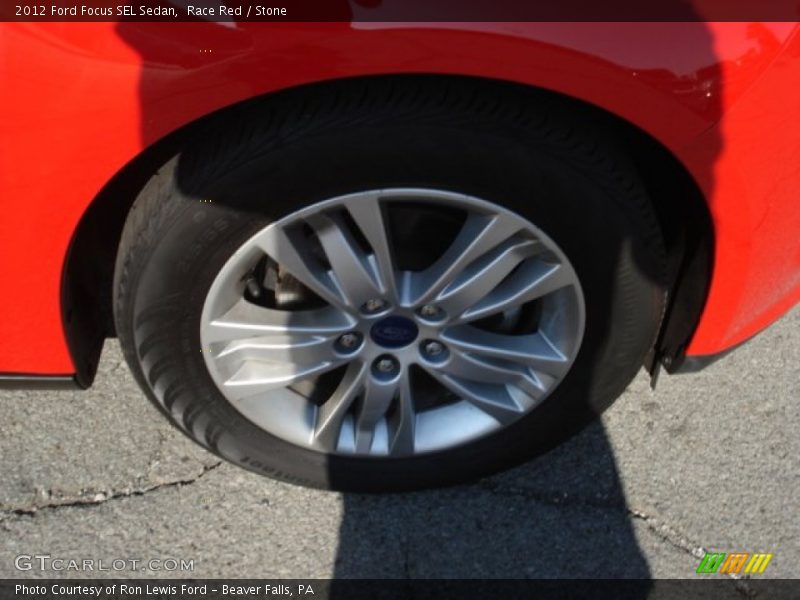 Race Red / Stone 2012 Ford Focus SEL Sedan