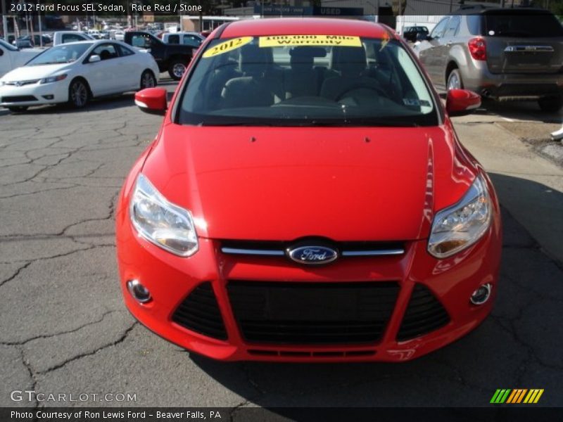 Race Red / Stone 2012 Ford Focus SEL Sedan