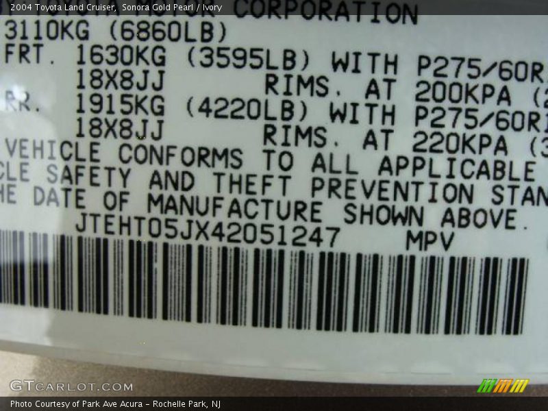 Sonora Gold Pearl / Ivory 2004 Toyota Land Cruiser