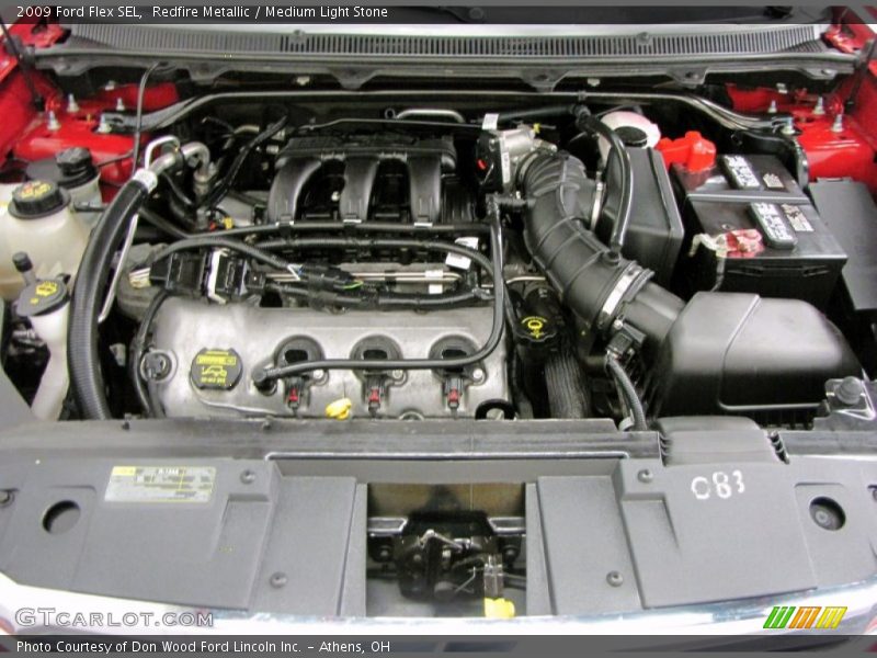 Redfire Metallic / Medium Light Stone 2009 Ford Flex SEL