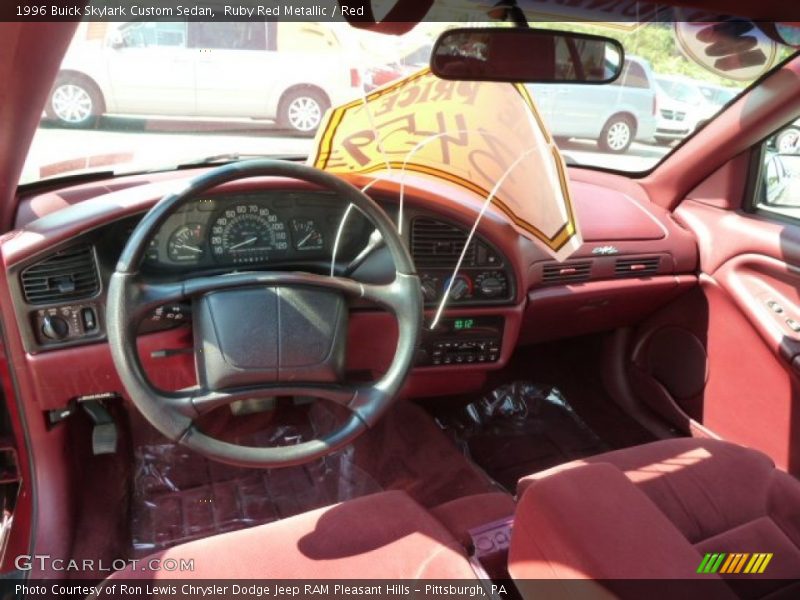 Ruby Red Metallic / Red 1996 Buick Skylark Custom Sedan