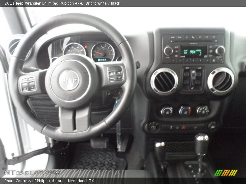 Bright White / Black 2011 Jeep Wrangler Unlimited Rubicon 4x4
