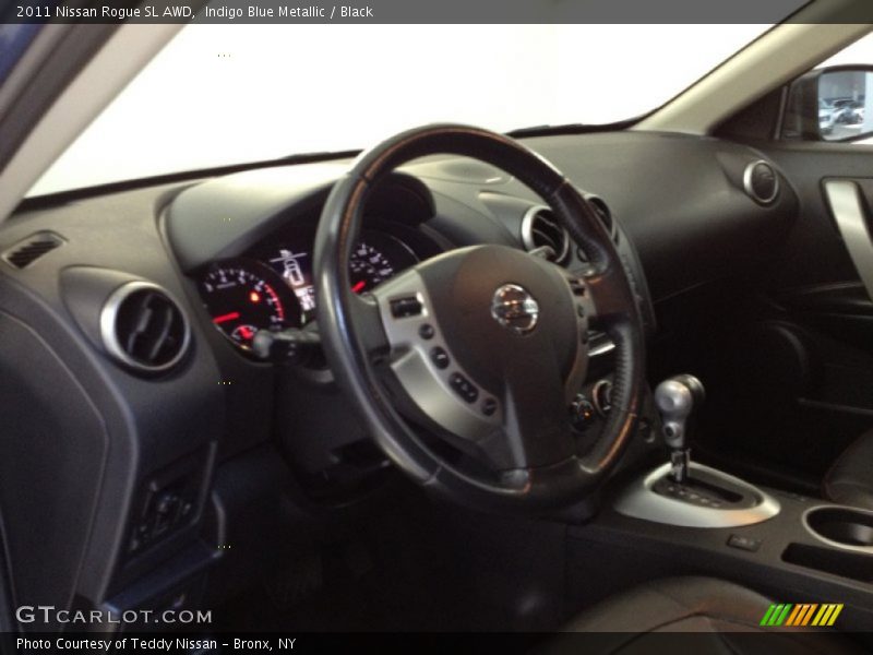 Indigo Blue Metallic / Black 2011 Nissan Rogue SL AWD