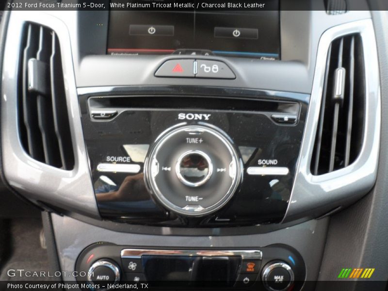 White Platinum Tricoat Metallic / Charcoal Black Leather 2012 Ford Focus Titanium 5-Door