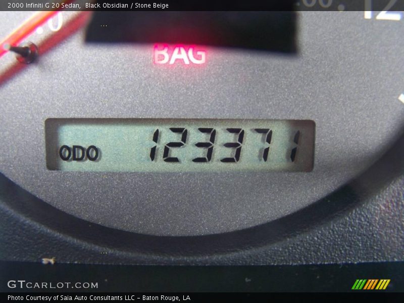 Black Obsidian / Stone Beige 2000 Infiniti G 20 Sedan