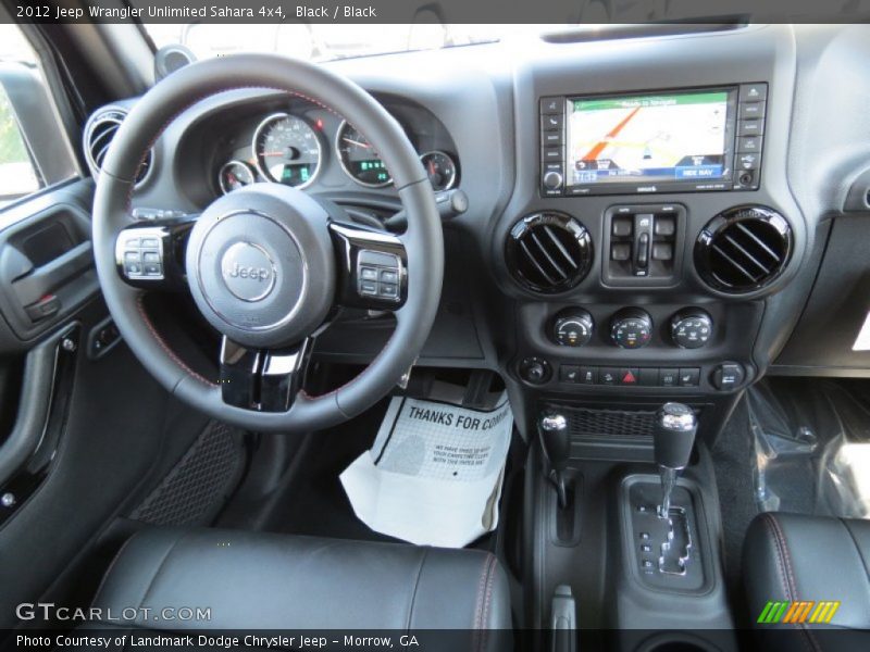 Dashboard of 2012 Wrangler Unlimited Sahara 4x4