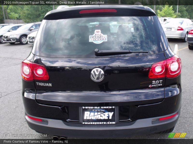 Deep Black Metallic / Sandstone 2010 Volkswagen Tiguan SEL 4Motion