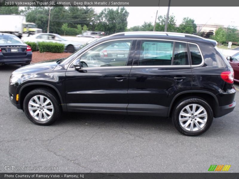 Deep Black Metallic / Sandstone 2010 Volkswagen Tiguan SEL 4Motion