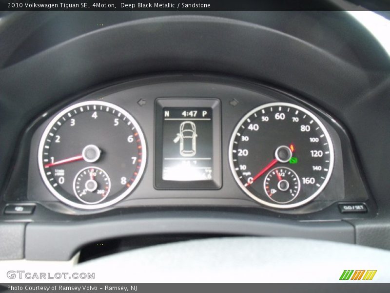 Deep Black Metallic / Sandstone 2010 Volkswagen Tiguan SEL 4Motion
