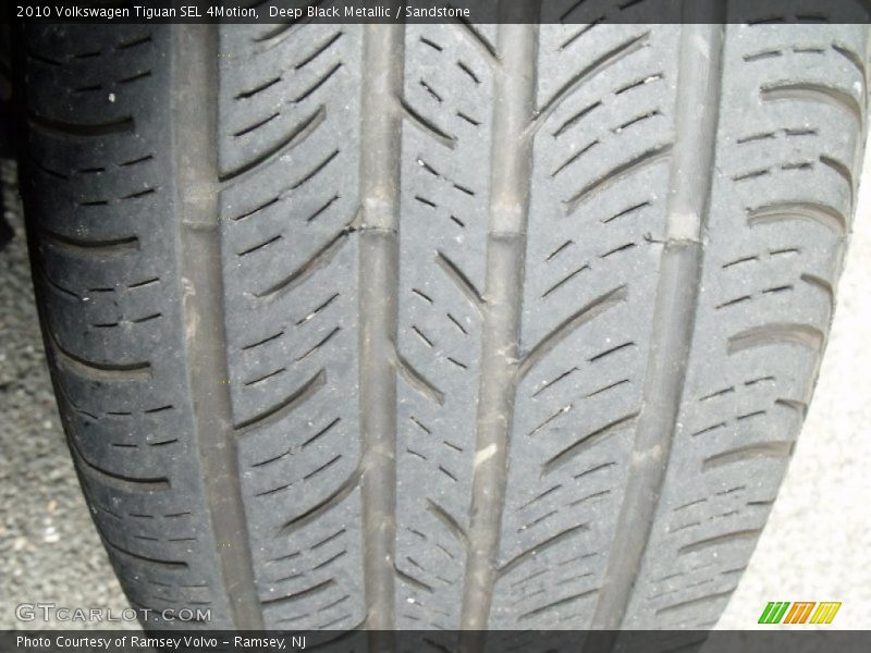 Deep Black Metallic / Sandstone 2010 Volkswagen Tiguan SEL 4Motion
