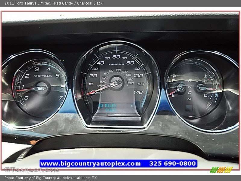 Red Candy / Charcoal Black 2011 Ford Taurus Limited
