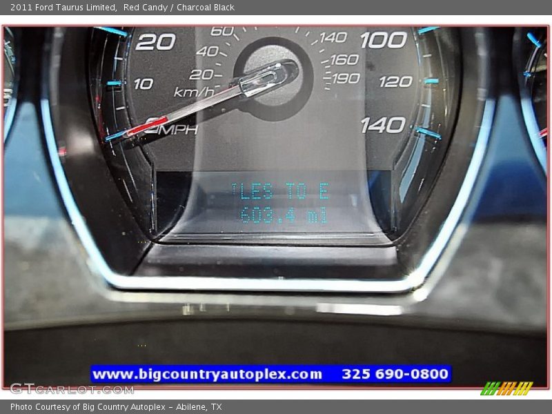 Red Candy / Charcoal Black 2011 Ford Taurus Limited