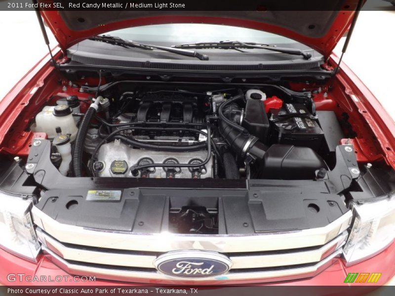 Red Candy Metallic / Medium Light Stone 2011 Ford Flex SEL
