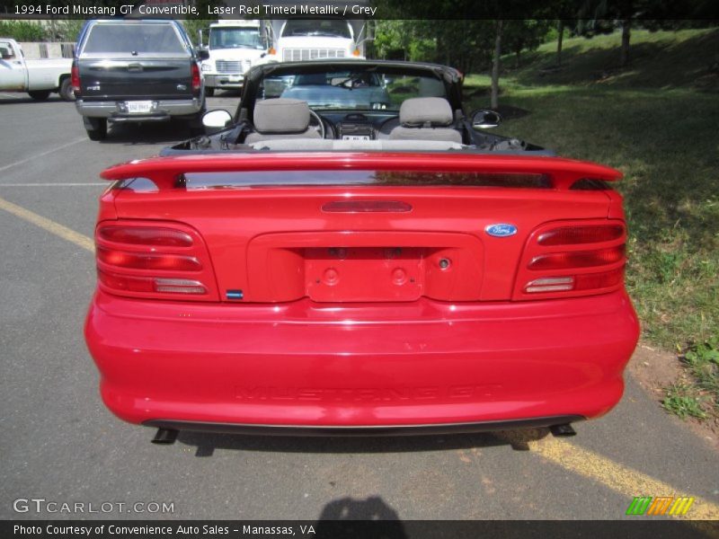 Laser Red Tinted Metallic / Grey 1994 Ford Mustang GT Convertible
