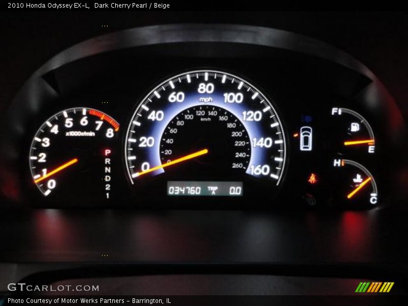 Dark Cherry Pearl / Beige 2010 Honda Odyssey EX-L