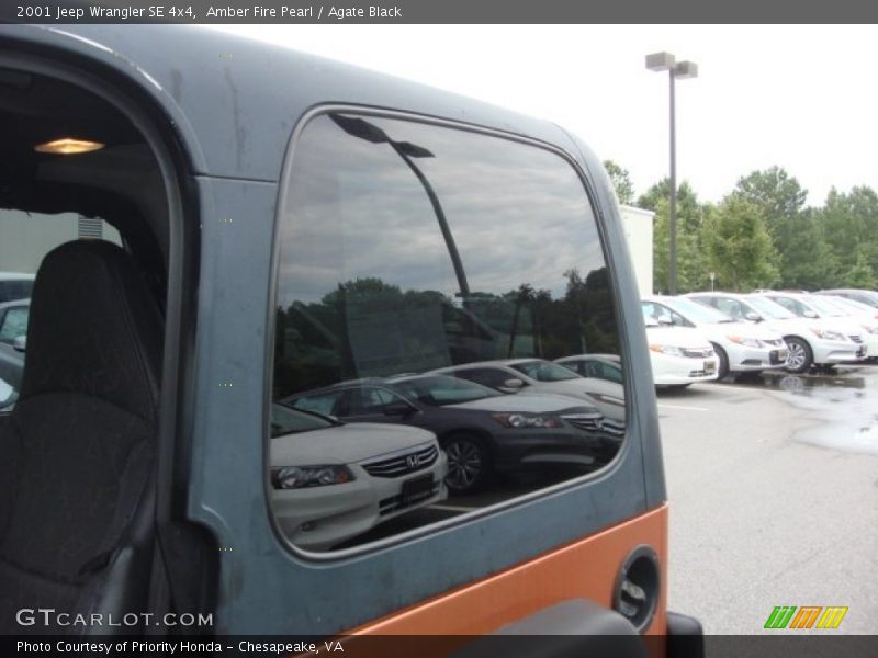 Amber Fire Pearl / Agate Black 2001 Jeep Wrangler SE 4x4