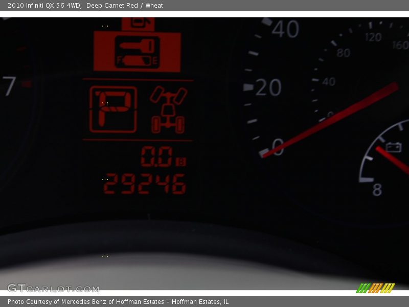 Deep Garnet Red / Wheat 2010 Infiniti QX 56 4WD