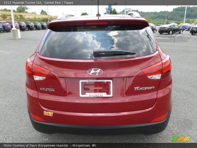 Garnet Red / Taupe 2013 Hyundai Tucson GLS