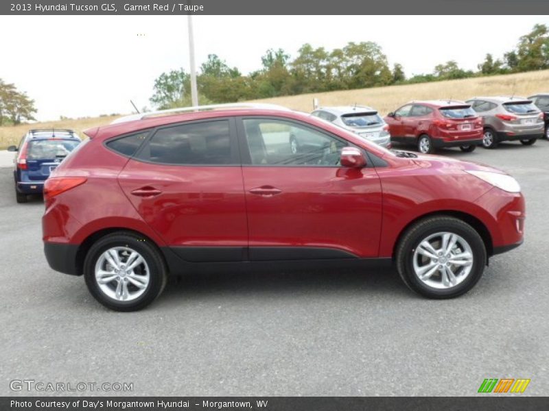 Garnet Red / Taupe 2013 Hyundai Tucson GLS