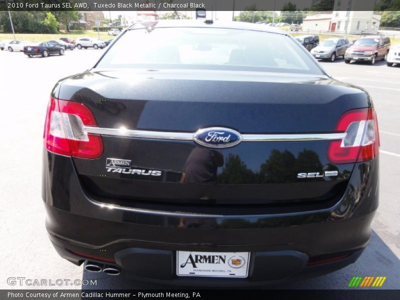 Tuxedo Black Metallic / Charcoal Black 2010 Ford Taurus SEL AWD
