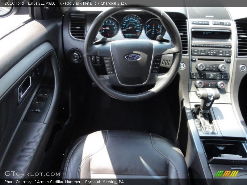 Tuxedo Black Metallic / Charcoal Black 2010 Ford Taurus SEL AWD