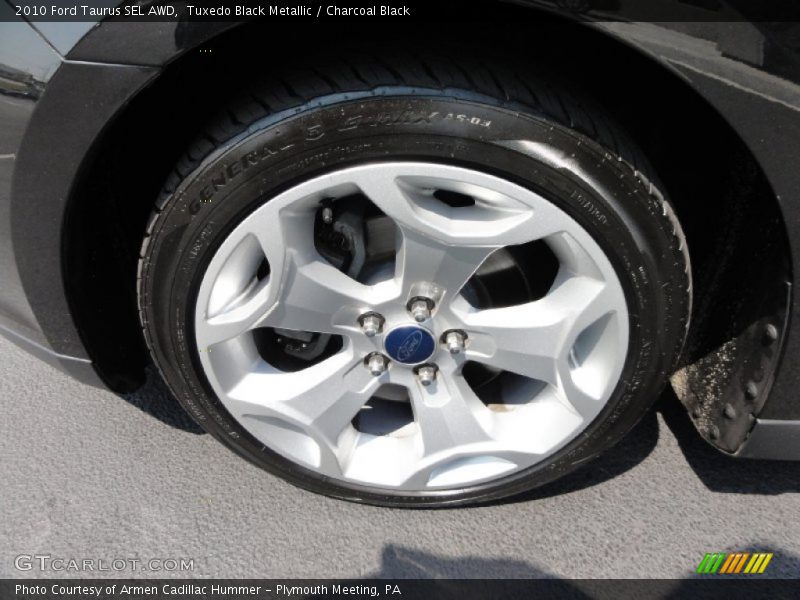 Tuxedo Black Metallic / Charcoal Black 2010 Ford Taurus SEL AWD