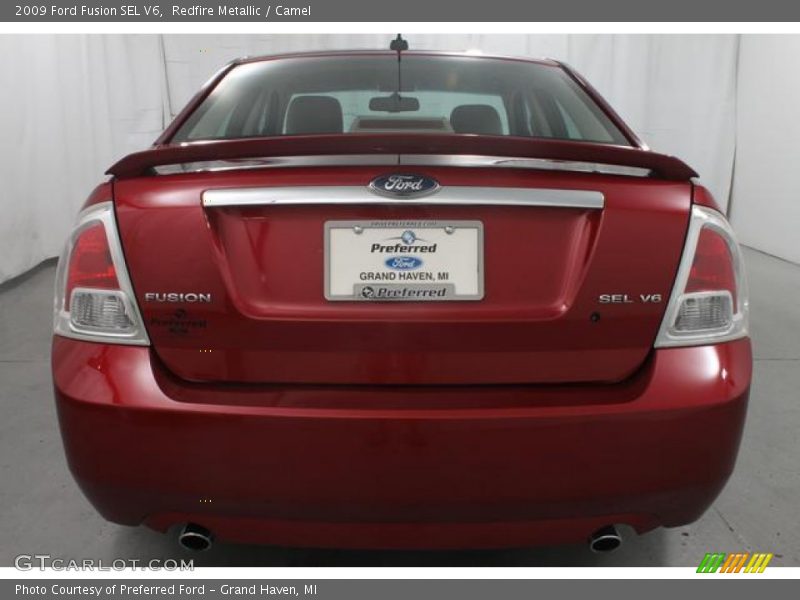 Redfire Metallic / Camel 2009 Ford Fusion SEL V6