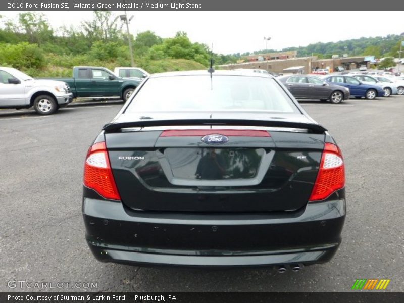 Atlantis Green Metallic / Medium Light Stone 2010 Ford Fusion SE