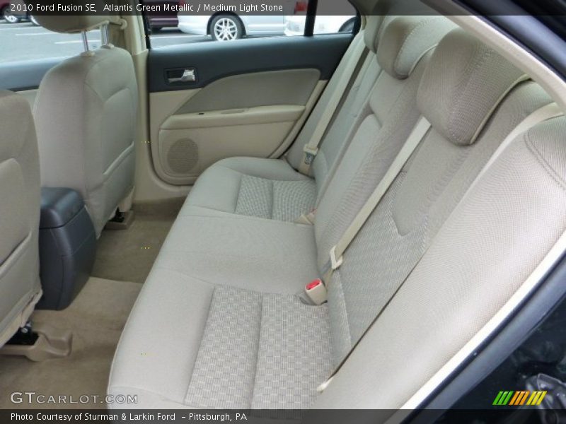 Atlantis Green Metallic / Medium Light Stone 2010 Ford Fusion SE