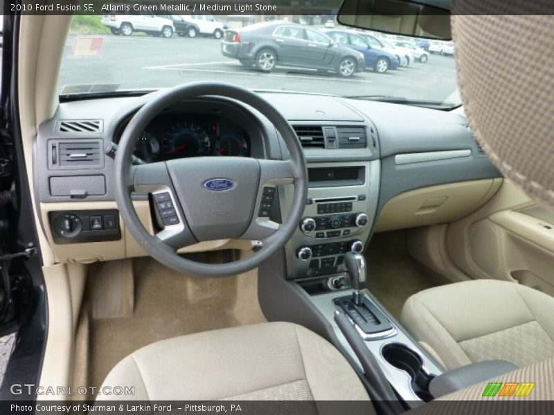 Atlantis Green Metallic / Medium Light Stone 2010 Ford Fusion SE
