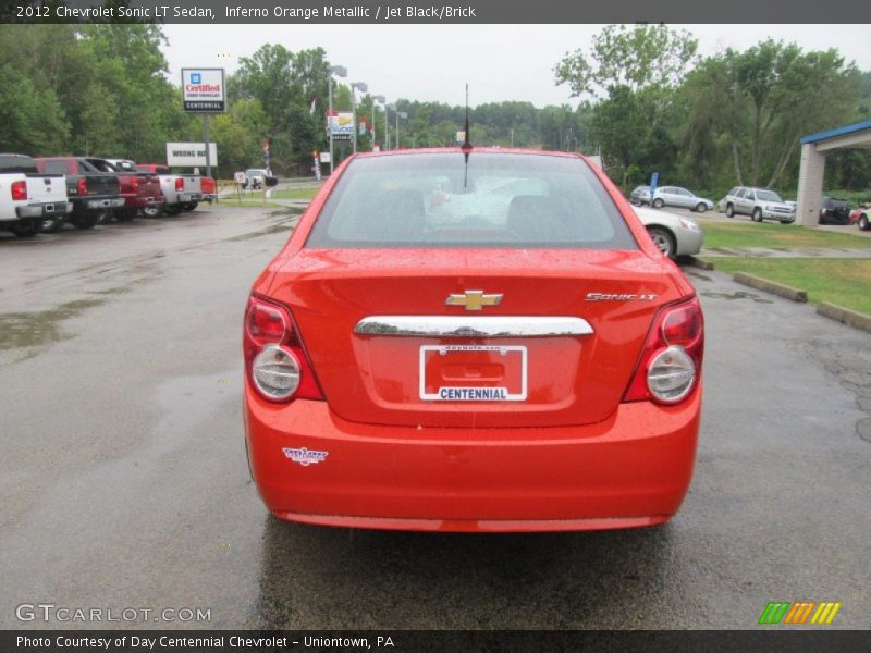 Inferno Orange Metallic / Jet Black/Brick 2012 Chevrolet Sonic LT Sedan