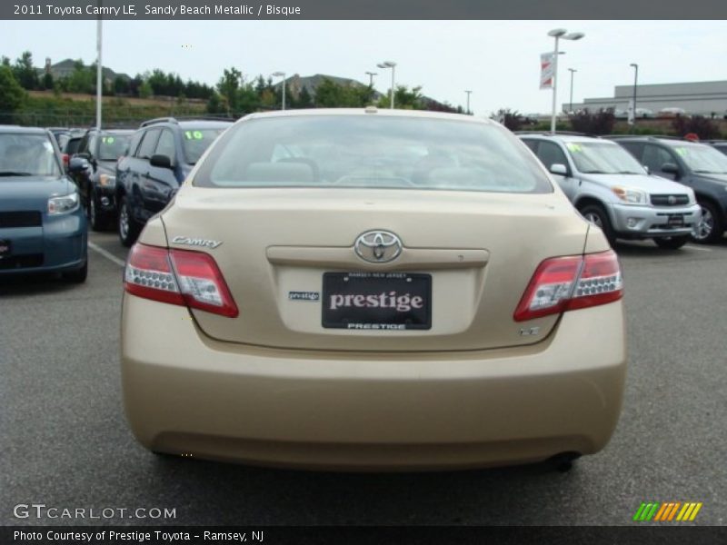 Sandy Beach Metallic / Bisque 2011 Toyota Camry LE