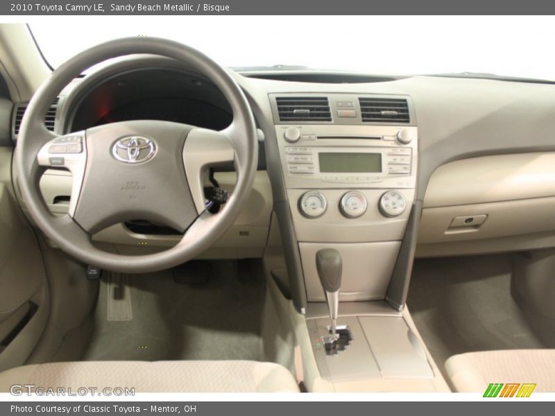 Sandy Beach Metallic / Bisque 2010 Toyota Camry LE