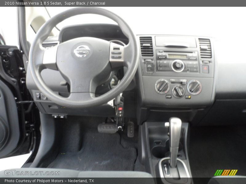 Super Black / Charcoal 2010 Nissan Versa 1.8 S Sedan