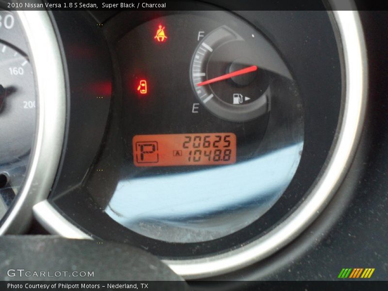 Super Black / Charcoal 2010 Nissan Versa 1.8 S Sedan