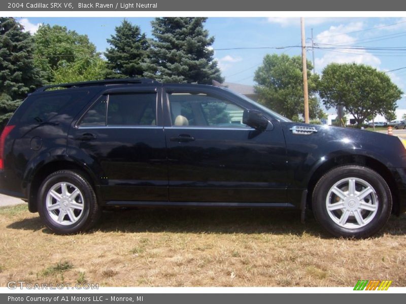 Black Raven / Light Neutral 2004 Cadillac SRX V6