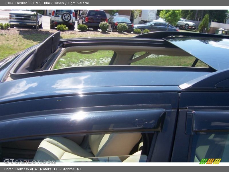 Black Raven / Light Neutral 2004 Cadillac SRX V6