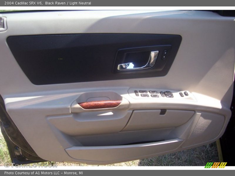 Black Raven / Light Neutral 2004 Cadillac SRX V6