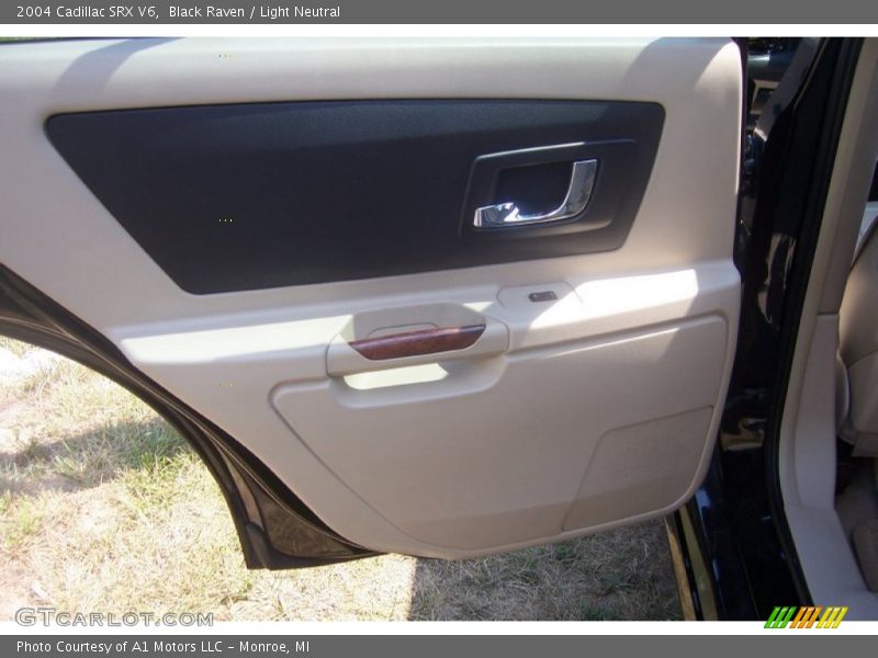 Black Raven / Light Neutral 2004 Cadillac SRX V6
