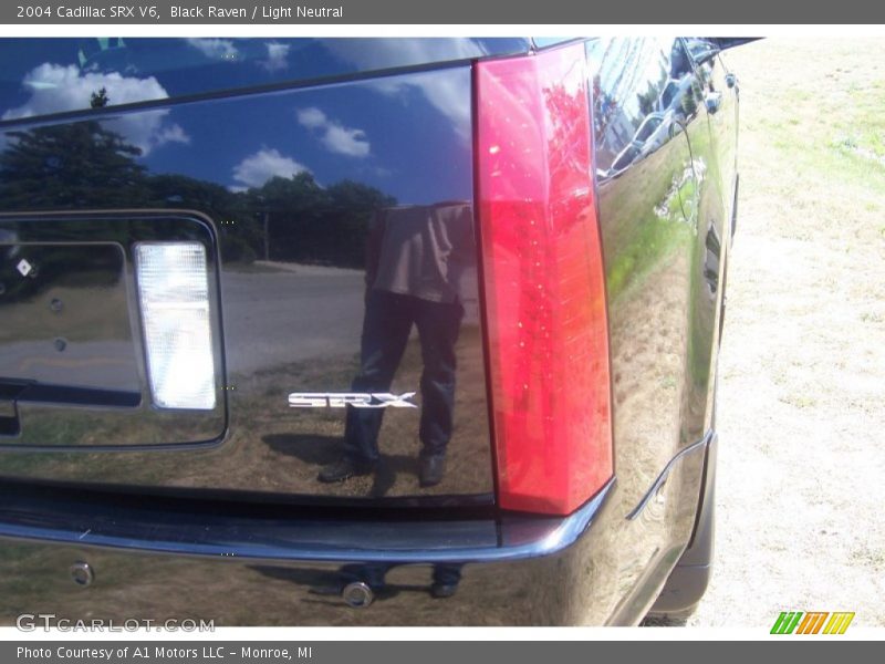 Black Raven / Light Neutral 2004 Cadillac SRX V6