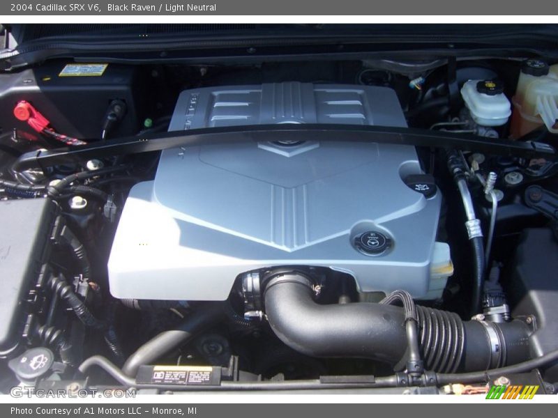 Black Raven / Light Neutral 2004 Cadillac SRX V6