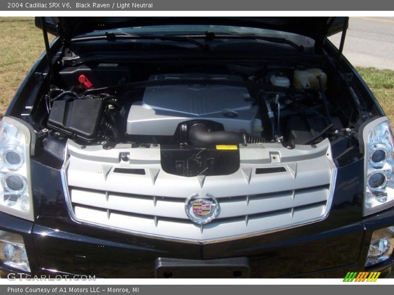 Black Raven / Light Neutral 2004 Cadillac SRX V6