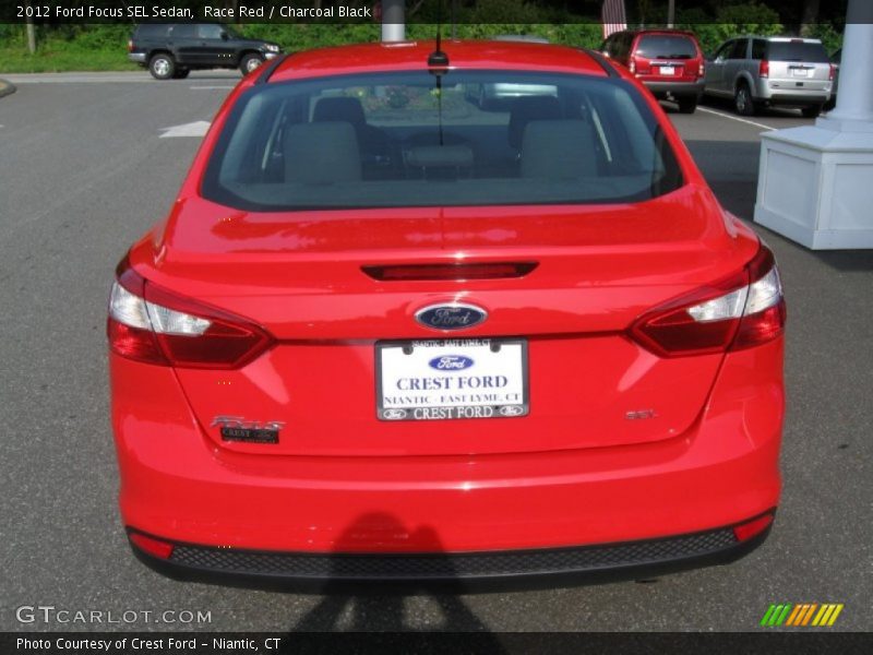 Race Red / Charcoal Black 2012 Ford Focus SEL Sedan