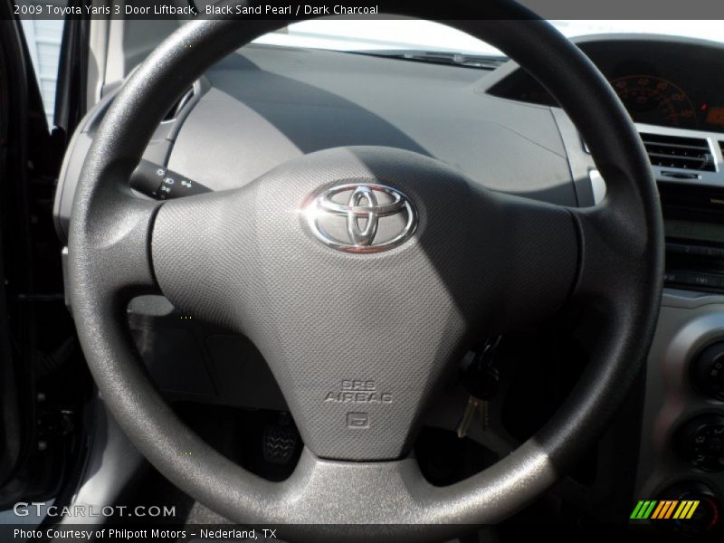 Black Sand Pearl / Dark Charcoal 2009 Toyota Yaris 3 Door Liftback
