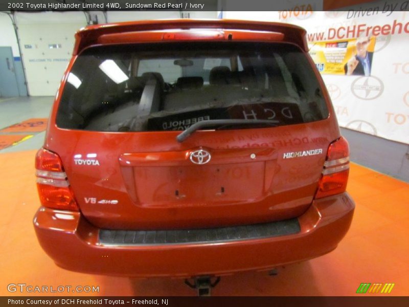 Sundown Red Pearl / Ivory 2002 Toyota Highlander Limited 4WD